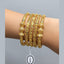 Dual-Tone Textured Gold Bangles with Diamond Accents – Rs. 2250