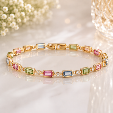 Elegant gold-tone multicolor crystal link bracelet with pink blue and green rectangular stones