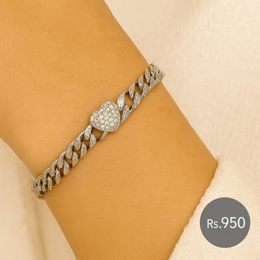 Silver-tone link bracelet with crystal heart charm on wrist – Destiny.pk