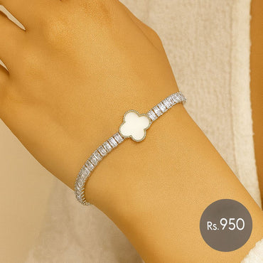 Silver-tone clover tennis bracelet with baguette CZ and white inlay on wrist – Destiny.pk