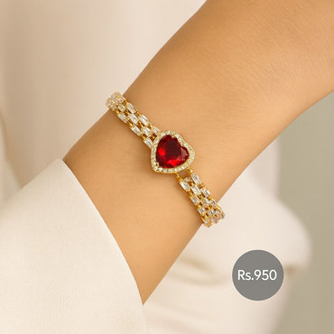 Gold-tone bracelet with red heart center and double-row baguette CZ on wrist – Destiny.pk