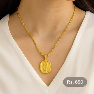 Gold-tone sunflower engraved pendant necklace with rope chain on model – Destiny.pk.