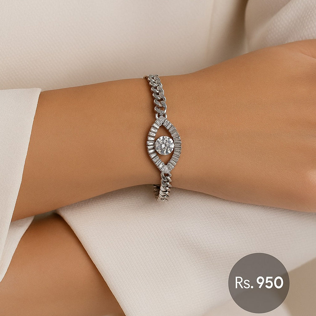 Silver-tone evil eye inspired CZ bracelet on model wrist – Destiny.pk