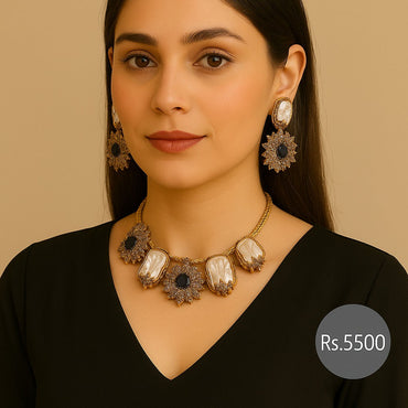 Gold-tone black & pearl statement necklace set with earrings on model – Destiny.pk