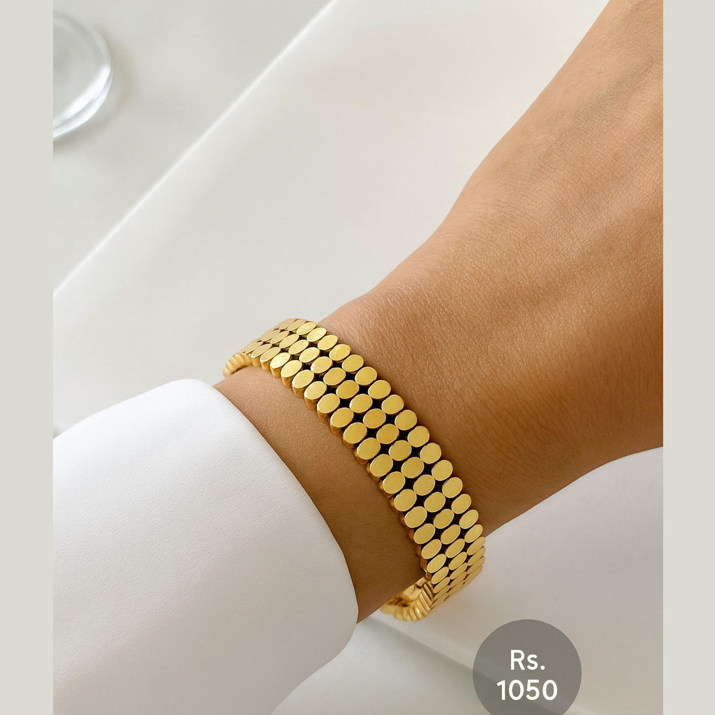 Gold-tone geometric coin link bracelet on model wrist – Destiny.pk