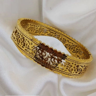 Gold-tone filigree cutwork bangle with scalloped edges – Destiny.pk.