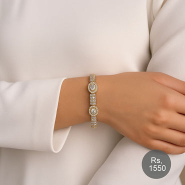 Oval halo CZ bracelet in gold-tone with cubic zirconia stones – Destiny.pk.