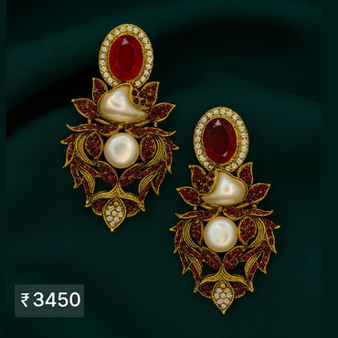 Gold-tone statement earrings with ruby red stones, pearls & leaf design – Destiny.pk.
