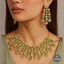Emerald green stone bridal necklace set with earrings in gold-tone finish – Destiny.pk.