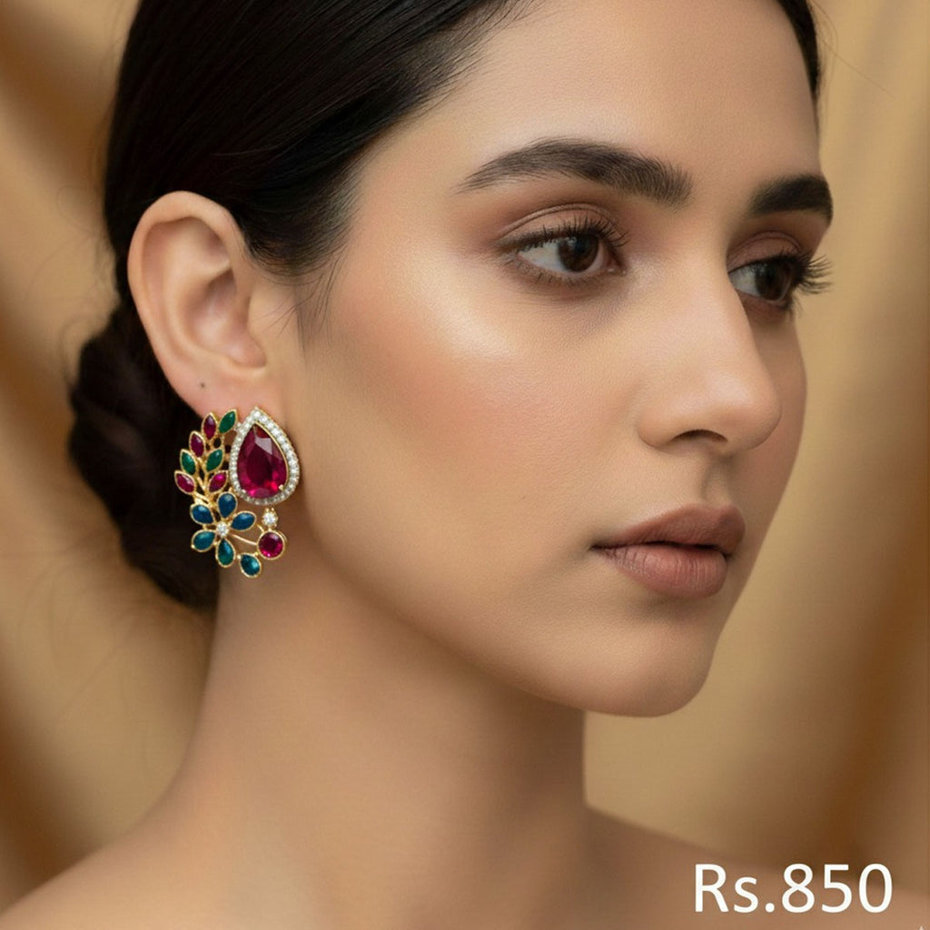 Gold-plated stud earrings with ruby, emerald, and sapphire-toned Kundan stones, priced at Rs. 850