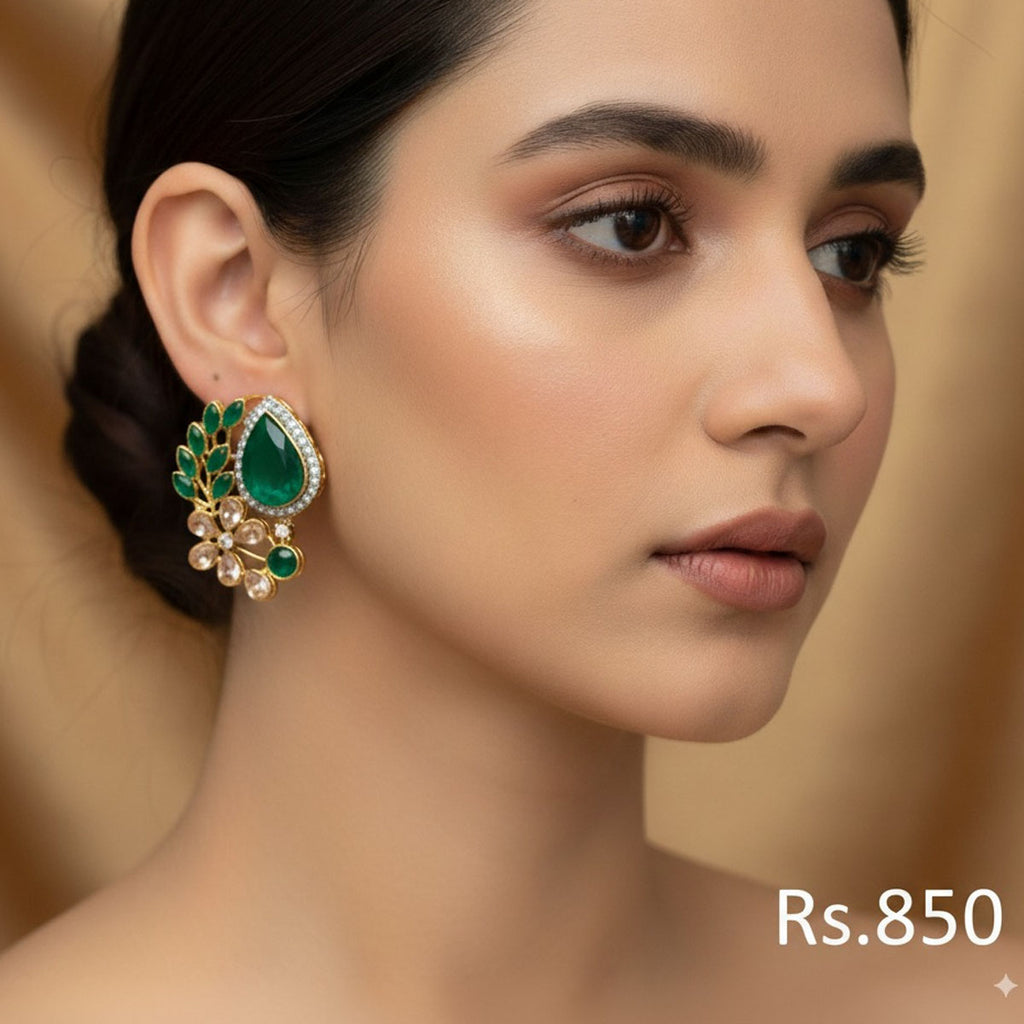 Gold-plated stud earrings with ruby, emerald, and sapphire-toned Kundan stones, priced at Rs. 850