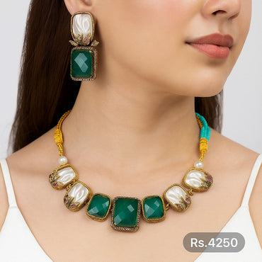Royal blue and pearl necklace set with matching earrings, priced Rs. 4250