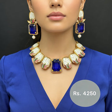 Royal blue and pearl necklace set with matching earrings, priced Rs. 4250