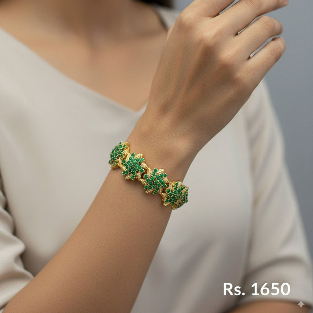 Gold-plated floral bracelet with sparkling stones, priced Rs. 1650