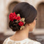 Red rose and gold floral hair accessory for bridal and festive hairstyles, priced Rs. 650