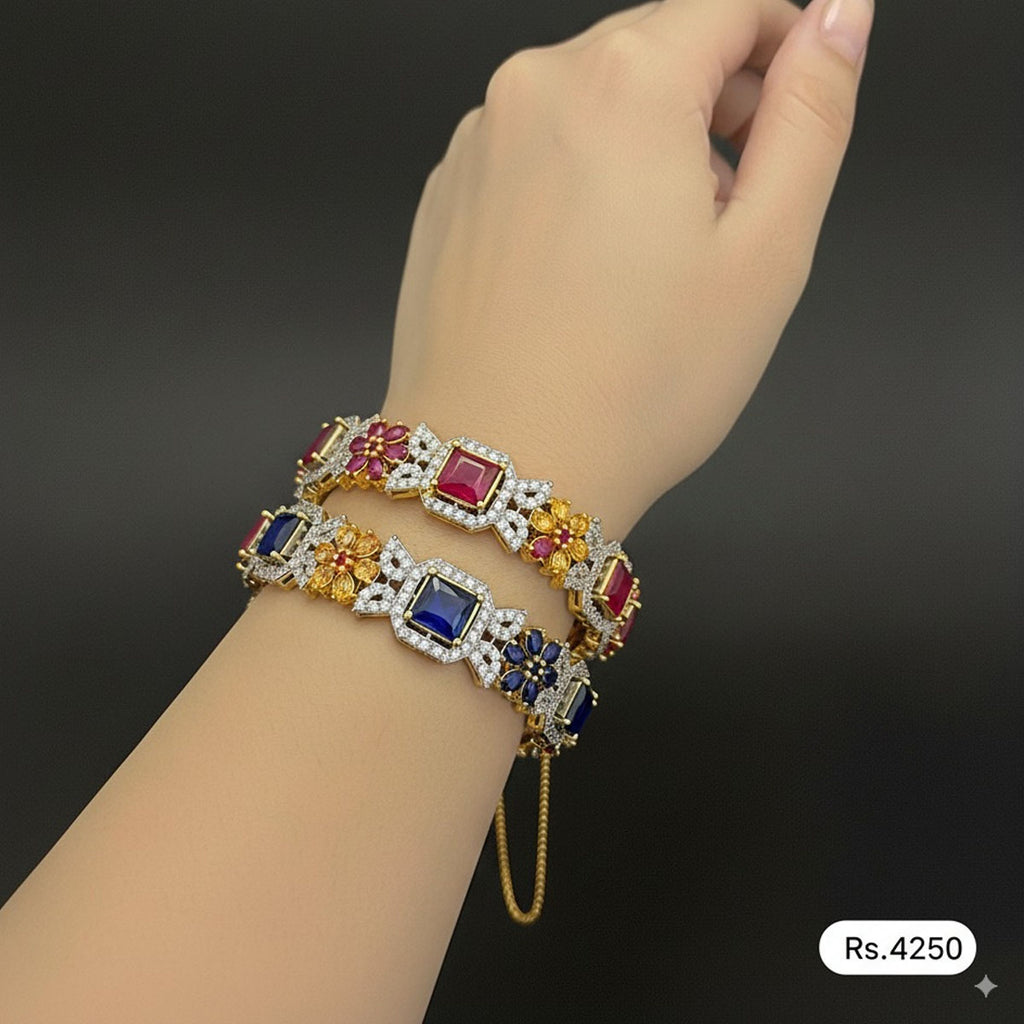 Gold-plated stone-studded bracelet pair with square-cut centerpiece stones, priced Rs. 4250