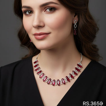 Sparkling American diamond necklace set with ruby-red centerpiece and earrings, price Rs. 3650