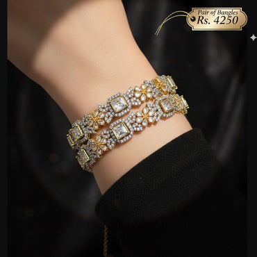 Gold-plated stone-studded bangle pair with sparkling cubic zirconia stones, priced Rs. 4250