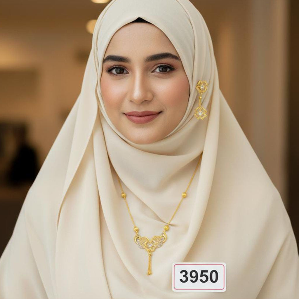 Traditional gold-plated necklace with matching dangle earrings, priced Rs. 3950