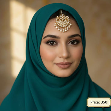 Traditional pearl and kundan maang tikka for women, priced Rs. 350