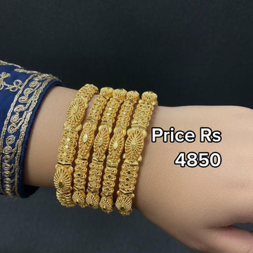 Traditional gold-plated bangle set with intricate design, priced Rs. 4850
