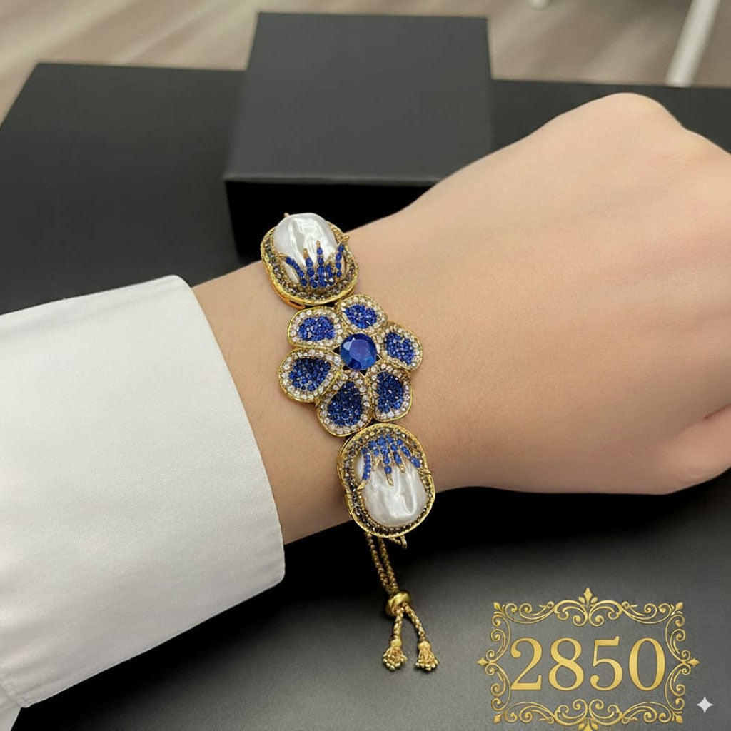 Ornate Pearl Flower Bangle Bracelet for Women - Rs 2850