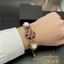 Ornate Pearl Flower Bangle Bracelet for Women - Rs 2850