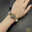 Ornate Pearl Flower Bangle Bracelet for Women - Rs 2850