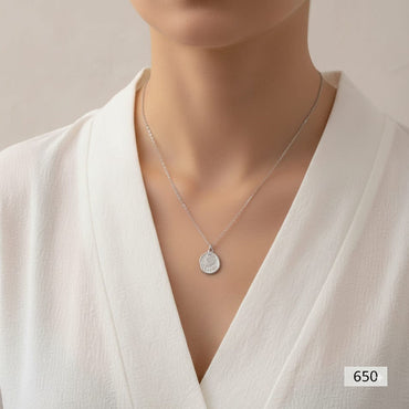 Dainty engraved medallion necklace for women in silver plating, priced Rs. 650