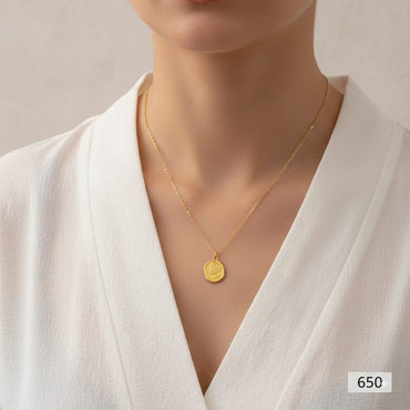 Dainty engraved medallion necklace for women in gold plating, priced Rs. 650