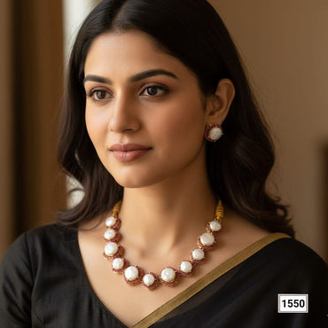 Gold-plated baroque pearl choker necklace with matching earrings, priced Rs. 1550