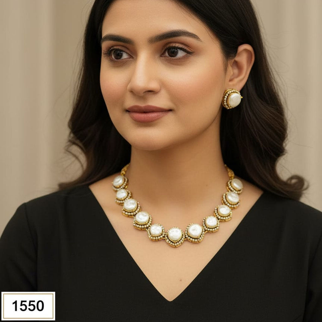 Gold-plated baroque pearl choker necklace with matching earrings, priced Rs. 1550