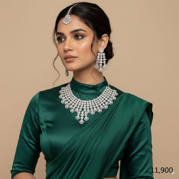 American Diamond bridal jewelry set with necklace, earrings, and maang tikka, priced Rs. 11,900