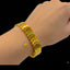 Chunky gold link bracelet with leaf motifs for women, priced Rs. 650