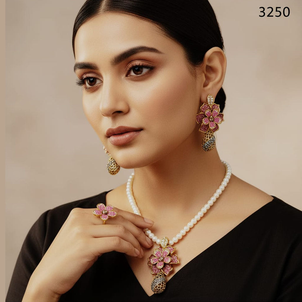 Elegant gold-plated necklace with tassel earrings for women, priced Rs. 3250