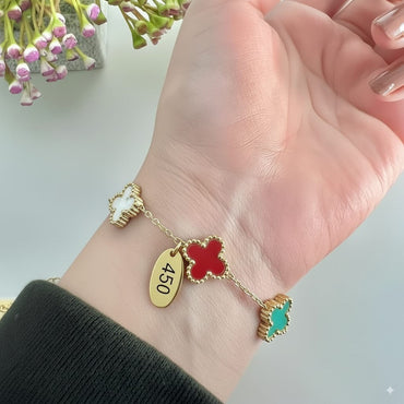 Four-leaf clover bracelet with dangling charms for women, priced Rs. 450