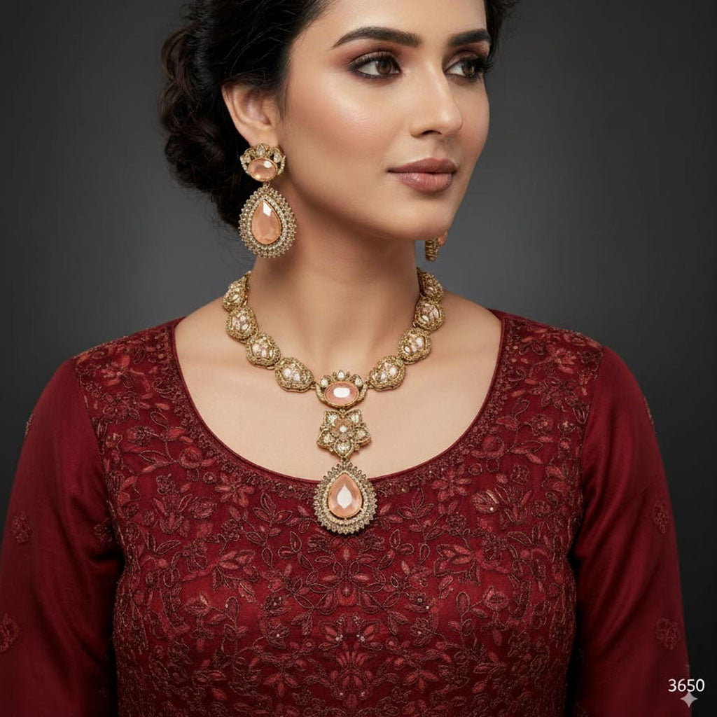 The Empress Bridal Set featuring pearl and antique gold necklace with earrings, priced Rs. 3650