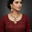 The Empress Bridal Set featuring pearl and antique gold necklace with earrings, priced Rs. 3650