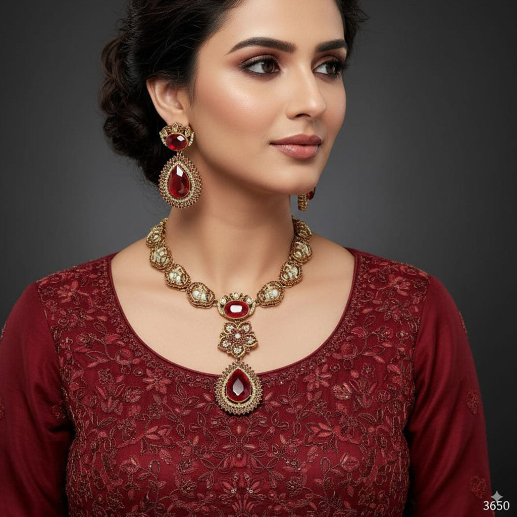 The Empress Bridal Set featuring pearl and antique gold necklace with earrings, priced Rs. 3650