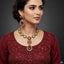 The Empress Bridal Set featuring pearl and antique gold necklace with earrings, priced Rs. 3650