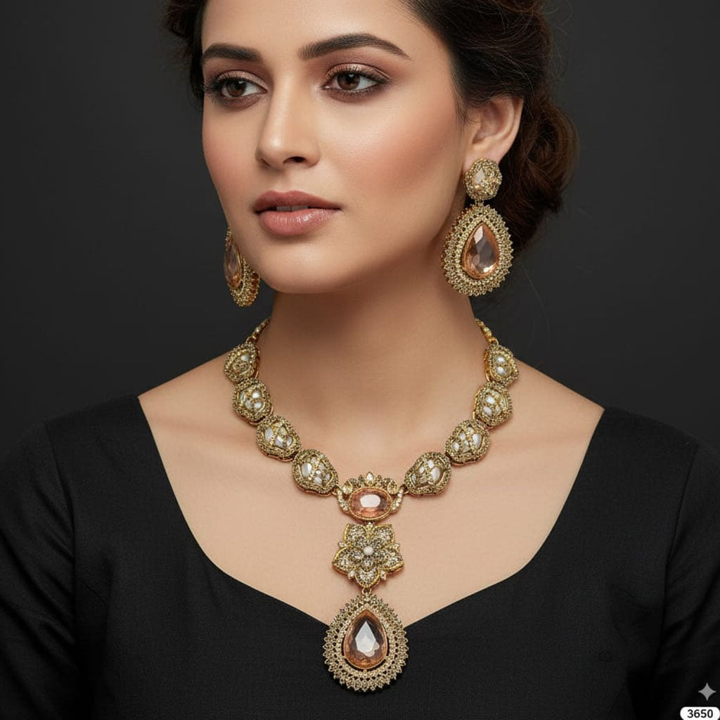 The Empress Bridal Set featuring pearl and antique gold necklace with earrings, priced Rs. 3650