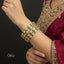 The Royal Kundan Bangle Stack with gold plating and Kundan stones, priced Rs. 4850