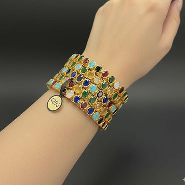 The Royal Kundan Bangle Stack with gold plating and Kundan stones, priced Rs. 4850