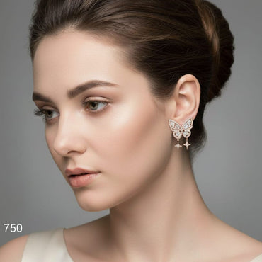 The Starfall Butterfly Earrings with sparkling crystal accents, priced Rs. 750