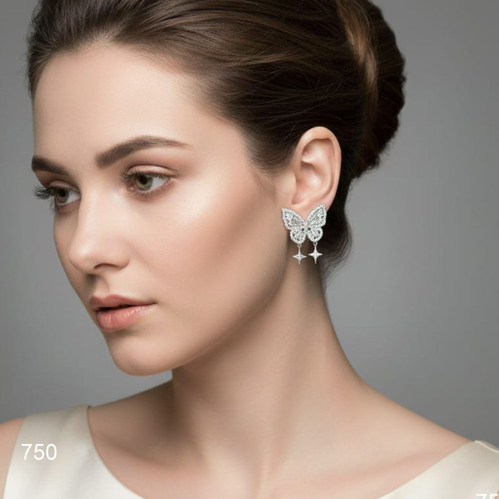 The Starfall Butterfly Earrings with sparkling crystal accents, priced Rs. 750