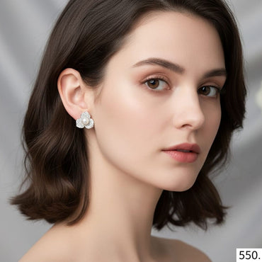 The Timeless Blossom Studs with floral crystal design, priced Rs. 550