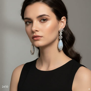 Moonlight Stone Earrings with rhinestone dangle design and gemstone accents, priced Rs. 2450