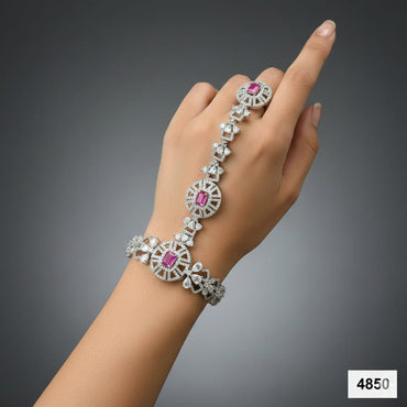 Designer hand bracelet with ring, studded with cubic zirconia stones, priced Rs. 4850