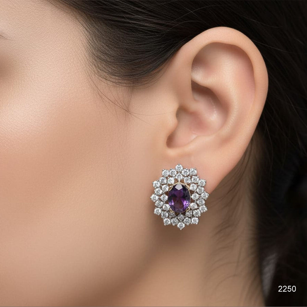 Versatile rhinestone flower earrings with sparkling gemstone center, priced Rs. 2250