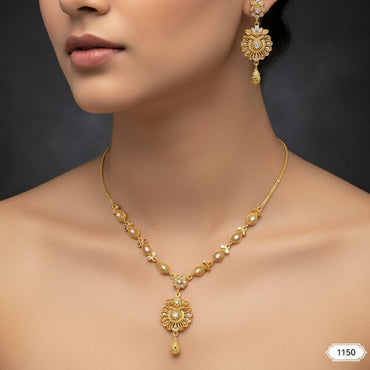 Gold plated floral motif necklace with matching earrings, priced Rs. 1150